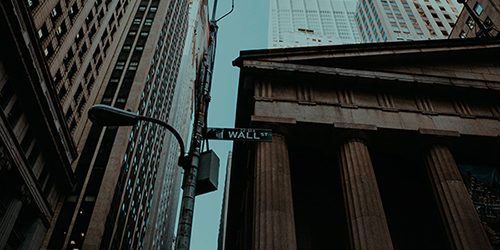 Low angle shot of wall street sign in NYC